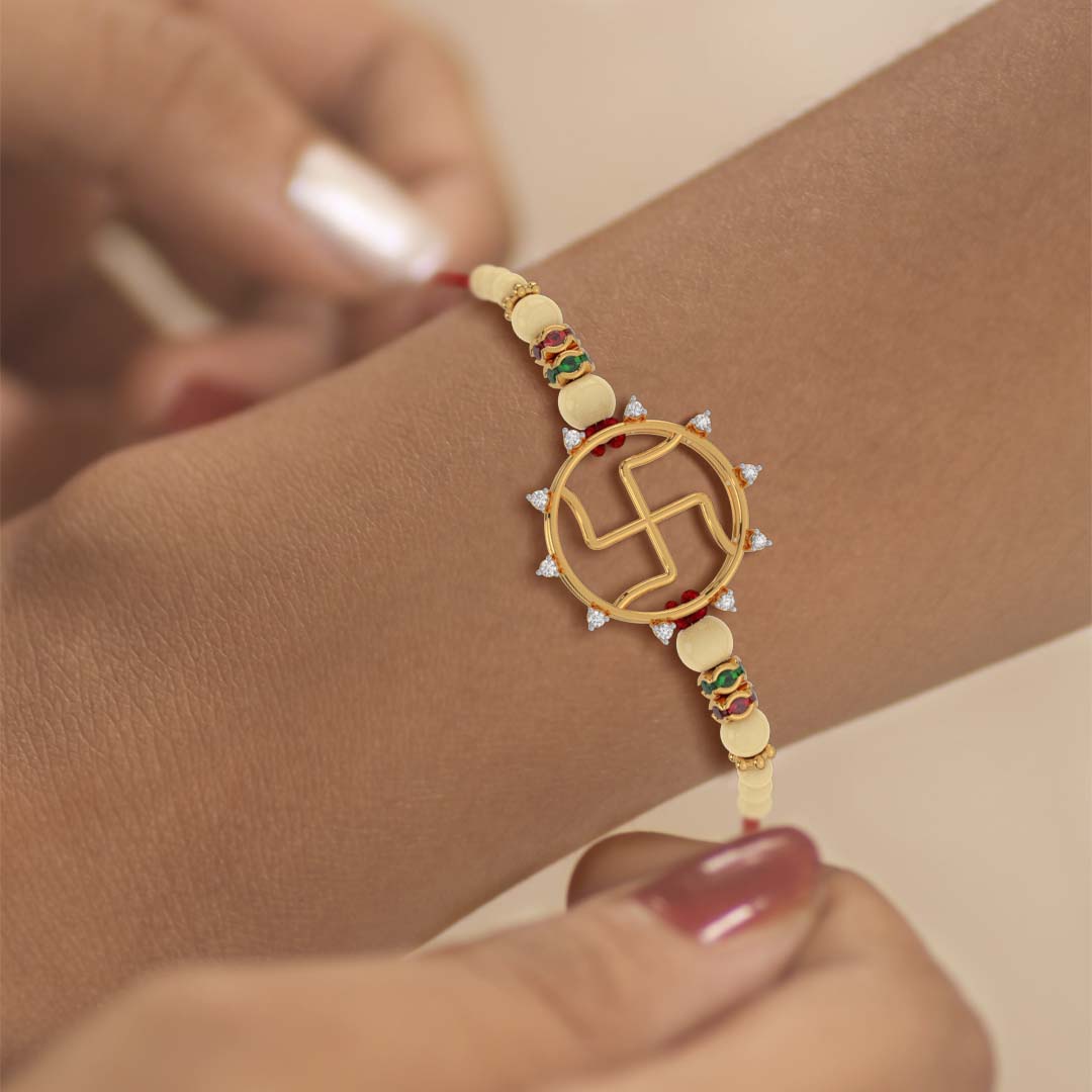 Swastika Rakhi Diamond Yellow Gold Rakhi